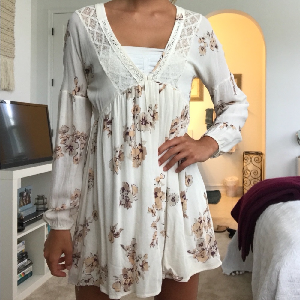cream colored floral long sleeve dress
